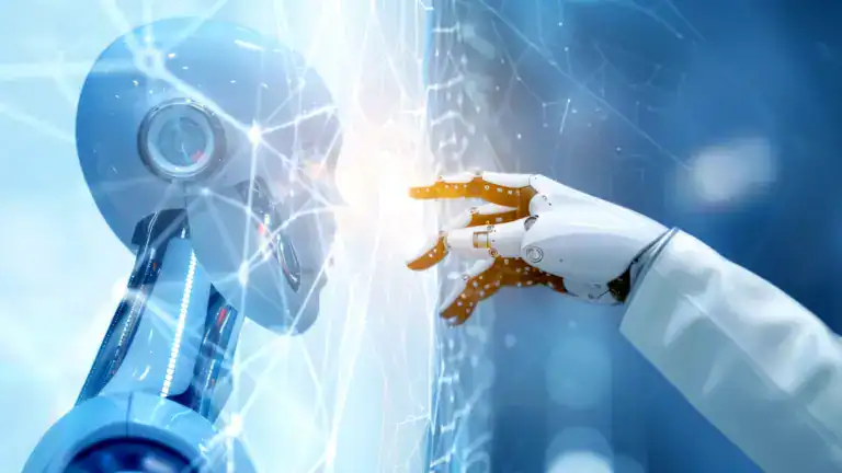 Powered robot and human hand touching in a digital environment.